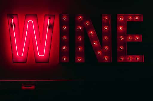 neon red "wine" sign